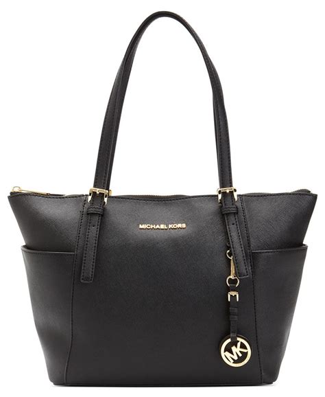 michael kors jet set top zip item tote bag|Michael Kors bag with airplanes.